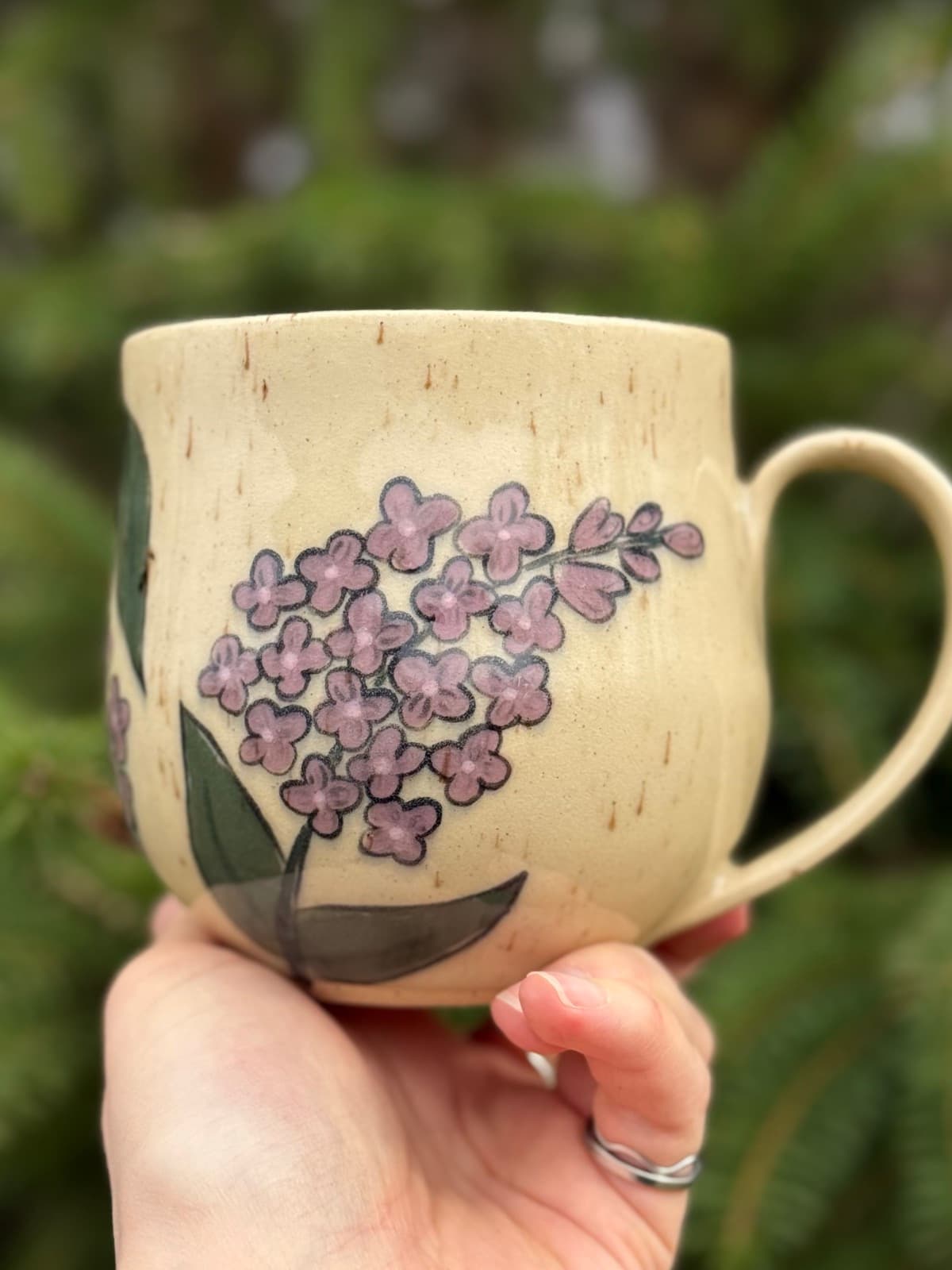 Hand Painted Lilac Ceramic Mug with purple lilac flowers on cream stoneware